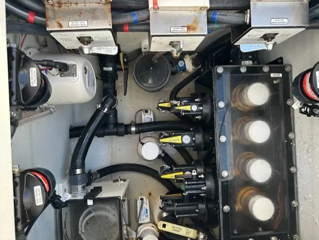  Yacht Photos Pics Engine compartment of 2023 SeaVee 370z boat, showcasing mechanical components and wiring.