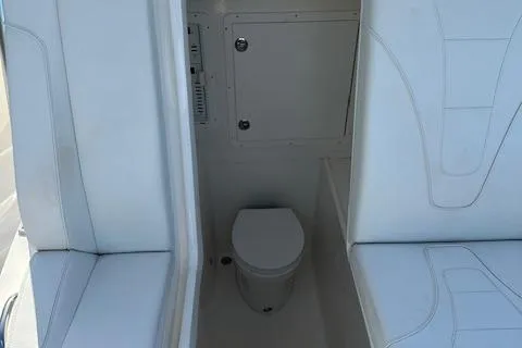  Yacht Photos Pics 2023 SeaVee 370z boat interior with compact marine toilet.