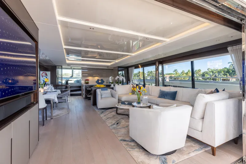White Star Yacht Photos Pics Luxurious interior of 2023 Sunseeker 90 Ocean yacht with elegant seating and dining area.