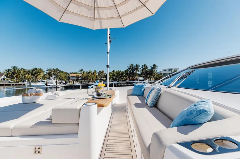 White Star Yacht Photos Pics Luxurious Sunseeker 90 Ocean yacht deck with elegant seating, 2023 model.