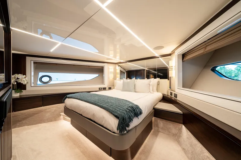 White Star Yacht Photos Pics Luxurious bedroom interior of 2023 Sunseeker 90 Ocean yacht with modern design.