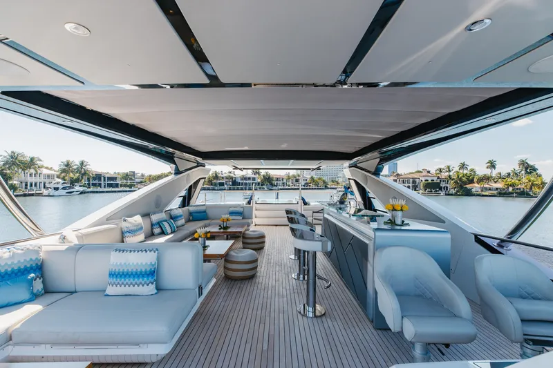 White Star Yacht Photos Pics Luxurious 2023 Sunseeker 90 Ocean yacht interior with elegant seating and bar area.