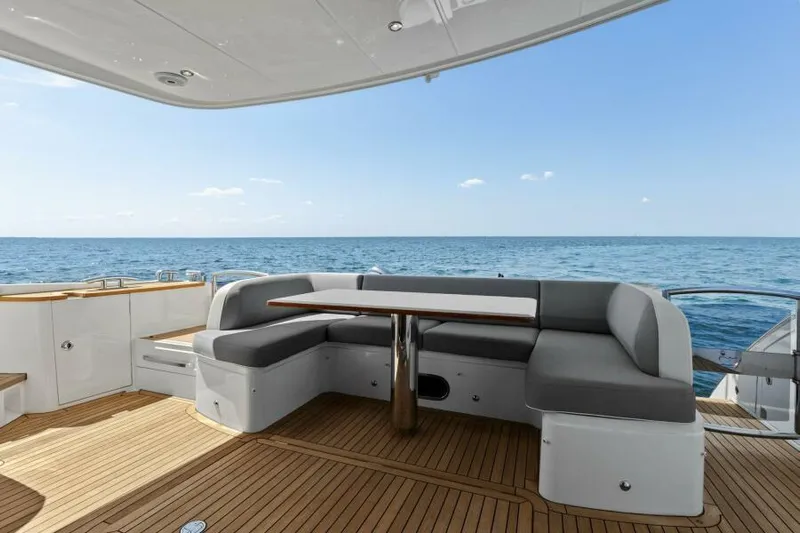 Princess Rose Too Yacht Photos Pics Luxurious 2016 Princess 60 Flybridge yacht with elegant seating and ocean view.