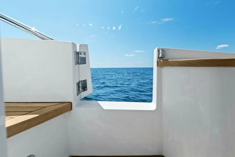 Princess Rose Too Yacht Photos Pics View from Princess 60 Flybridge yacht, 2016, overlooking the ocean under a clear blue sky.