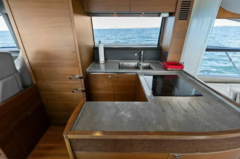 Princess Rose Too Yacht Photos Pics Modern kitchen on 2016 Princess 60 Flybridge yacht with ocean view.