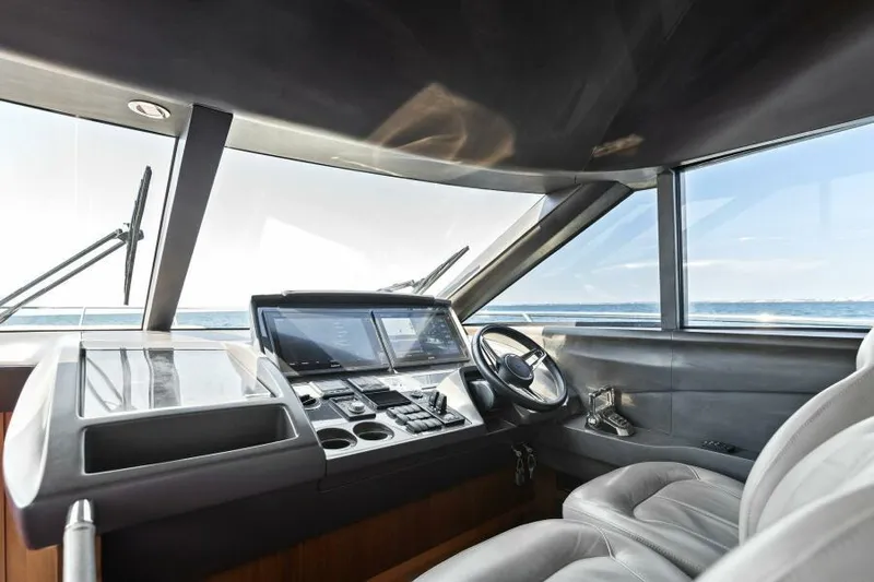 Princess Rose Too Yacht Photos Pics Luxurious 2016 Princess 60 Flybridge yacht cockpit with modern navigation controls.