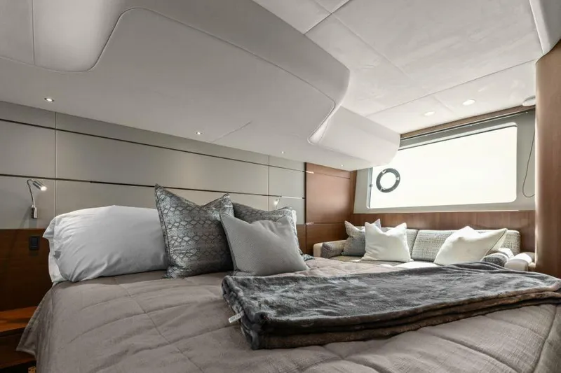 Princess Rose Too Yacht Photos Pics Luxurious bedroom interior of 2016 Princess 60 Flybridge yacht with modern decor.