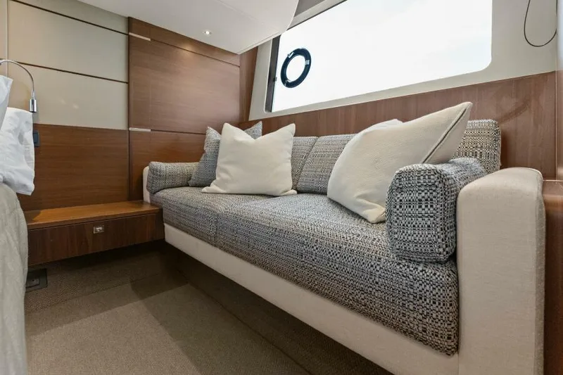 Princess Rose Too Yacht Photos Pics Luxurious interior of 2016 Princess 60 Flybridge yacht with elegant sofa and cushions.