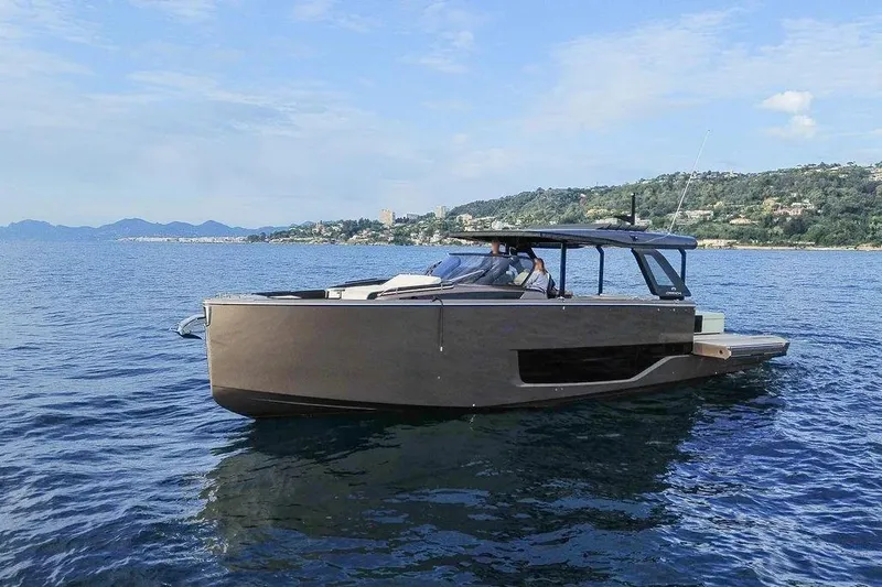  Yacht Photos Pics 2021 Cranchi A46 Luxury Tender yacht cruising on serene waters.