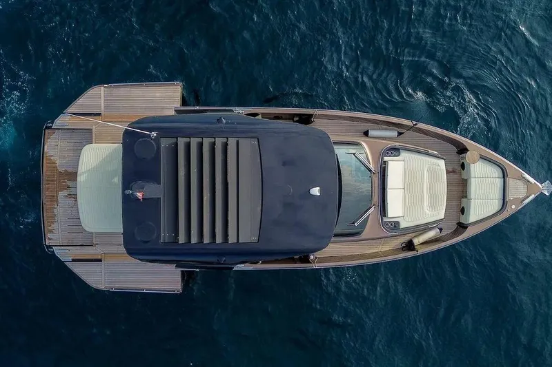  Yacht Photos Pics Overhead view of 2021 Cranchi A46 Luxury Tender yacht on blue water.