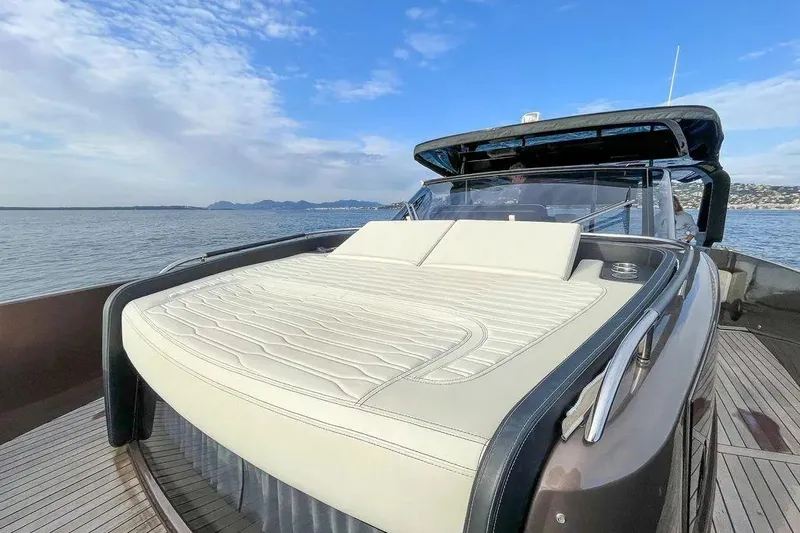  Yacht Photos Pics 2021 Cranchi A46 Luxury Tender with sunbed on open water.