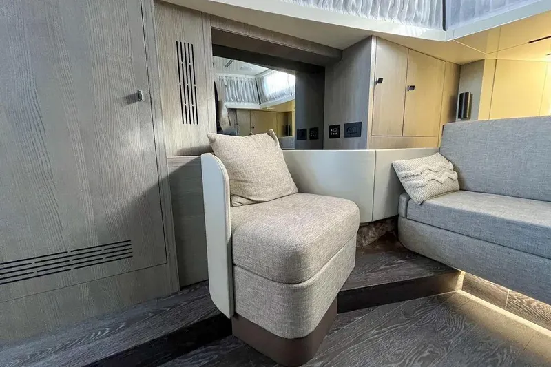  Yacht Photos Pics Luxurious interior of 2021 Cranchi A46 Luxury Tender with modern seating and elegant design.
