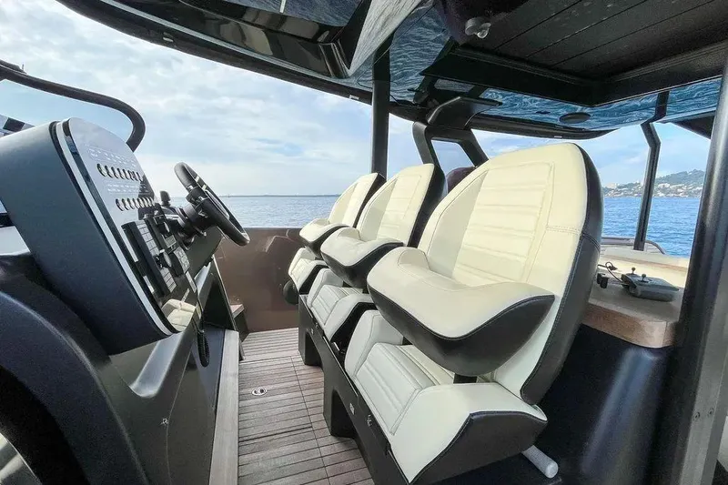  Yacht Photos Pics Interior of 2021 Cranchi A46 Luxury Tender with modern helm and plush seating.