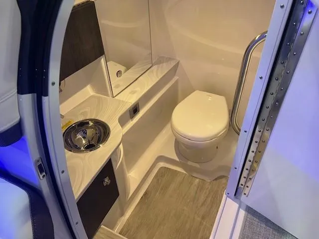  Yacht Photos Pics Interior of 2025 Formula 310 Bowrider I/O boat bathroom with modern fixtures.