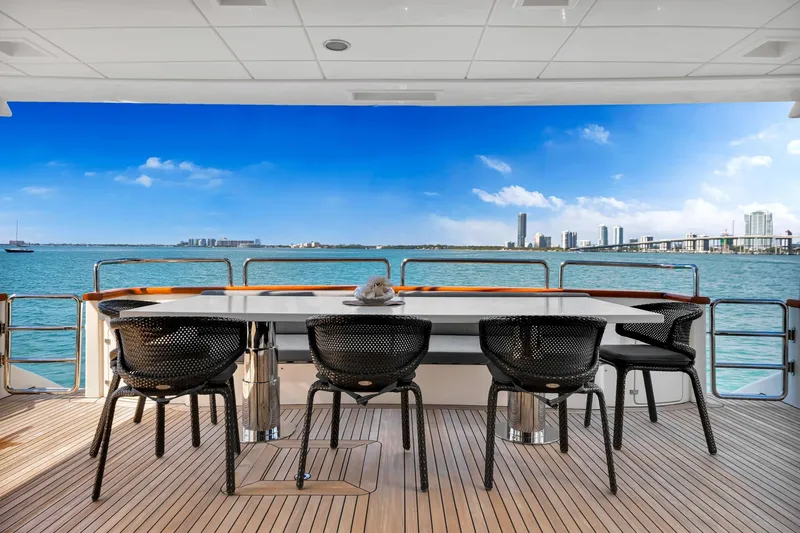 Babieca Yacht Photos Pics Luxury dining area on 2005 Azimut 105 yacht with ocean view.