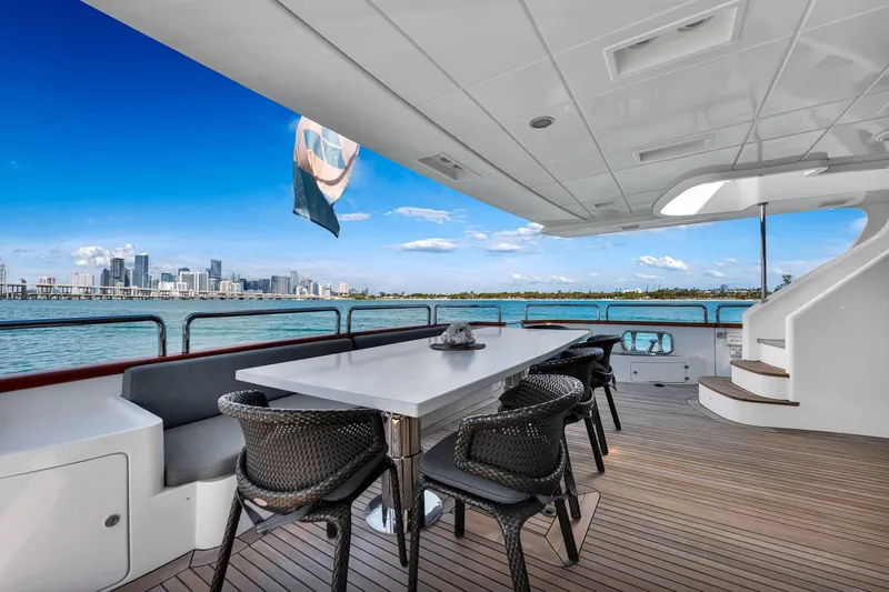 Babieca Yacht Photos Pics Luxury Azimut 105 yacht deck with city skyline view, 2005 model.