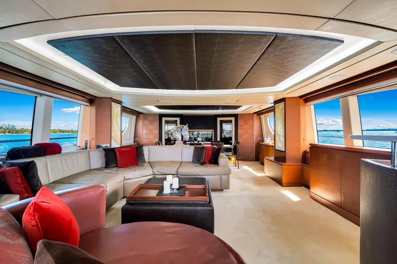 Babieca Yacht Photos Pics Luxurious interior of 2005 Azimut 105 yacht with elegant seating and panoramic windows.