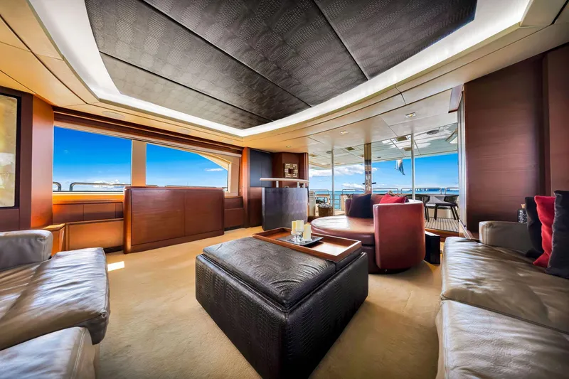 Babieca Yacht Photos Pics Luxurious interior of a 2005 Azimut 105 yacht with elegant seating and ocean views.