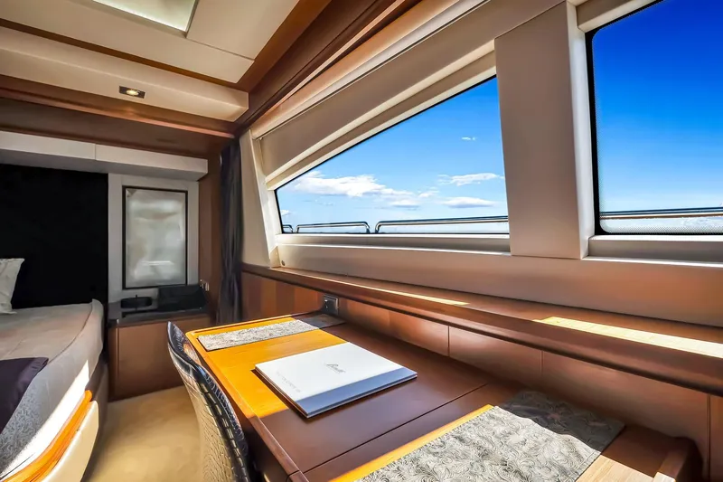 Babieca Yacht Photos Pics Luxurious interior of 2005 Azimut 105 yacht with ocean view through large windows.