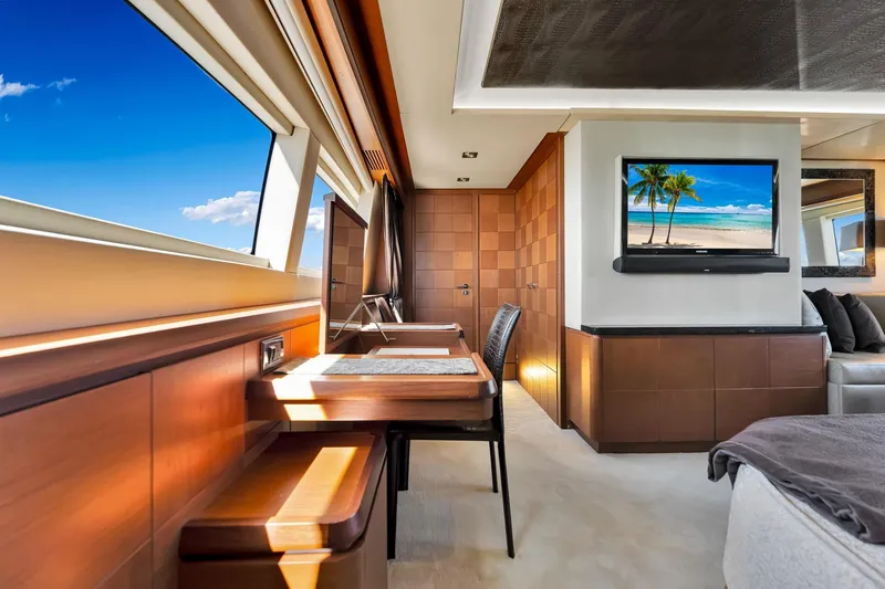 Babieca Yacht Photos Pics Luxurious interior of 2005 Azimut 105 yacht with elegant wood paneling and ocean view.