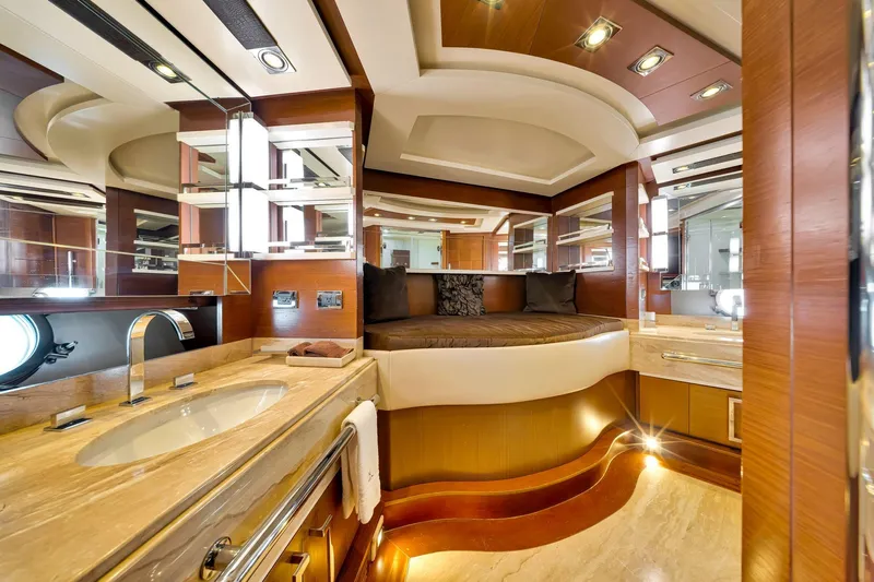 Babieca Yacht Photos Pics Luxurious interior of 2005 Azimut 105 yacht with elegant wood and marble finishes.