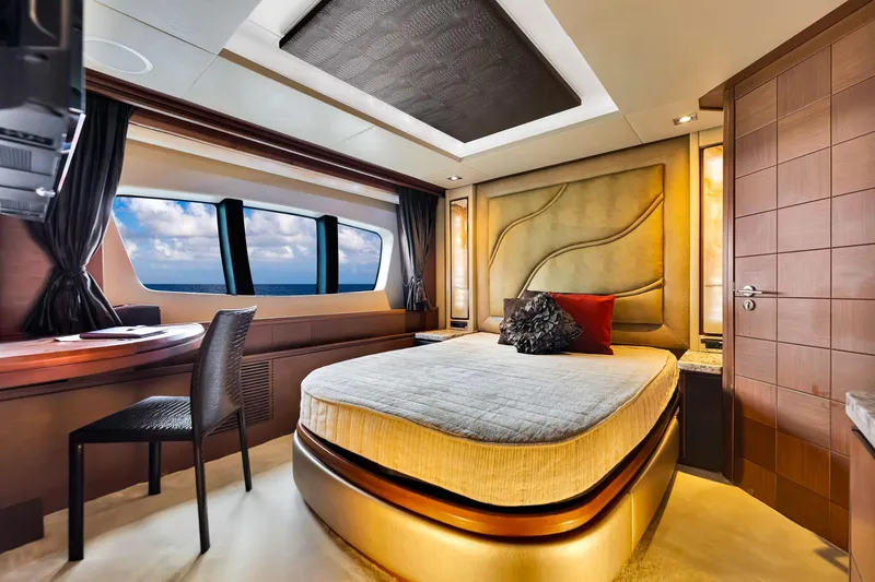 Babieca Yacht Photos Pics Luxurious bedroom interior of 2005 Azimut 105 yacht with ocean view.