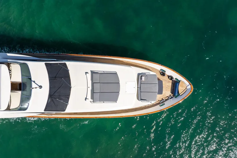 Babieca Yacht Photos Pics Aerial view of 2005 Azimut 105 yacht on turquoise water.