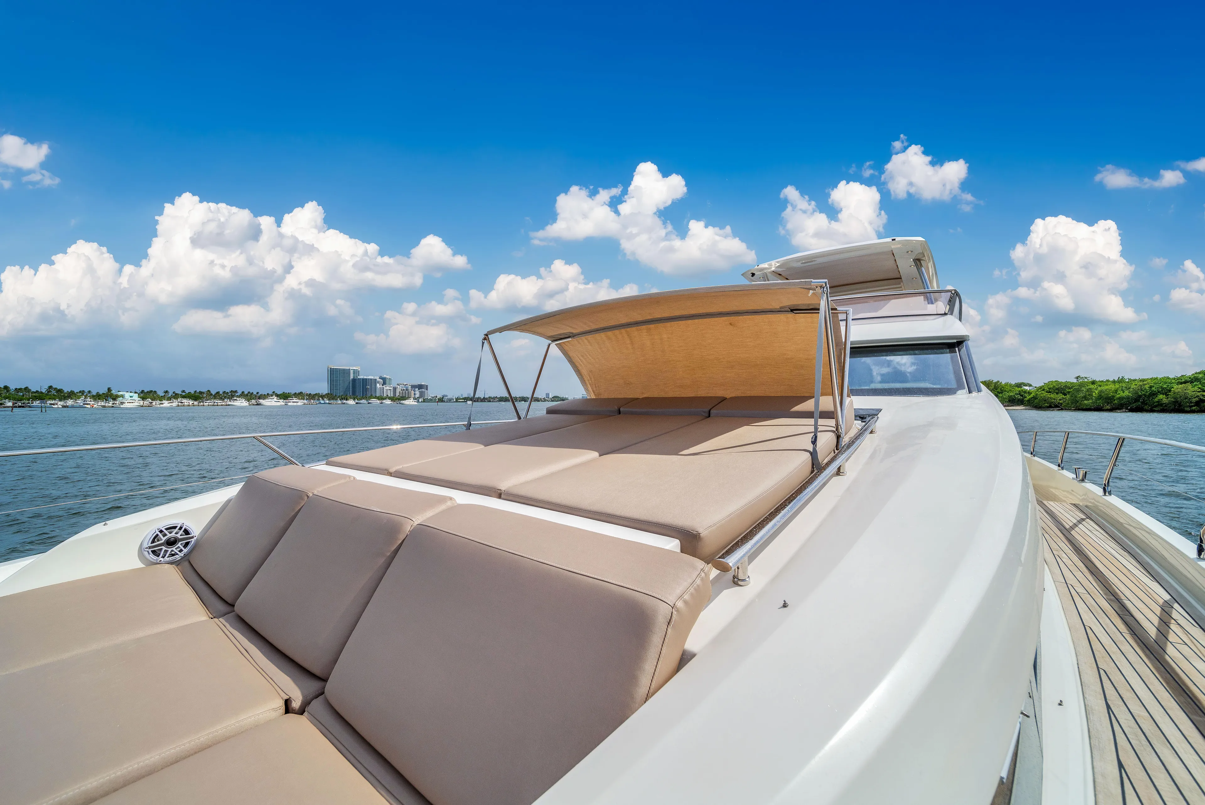 Oceana Yacht Photos Pics Luxury 2015 Prestige 750 yacht with sun deck, cruising on a sunny day.