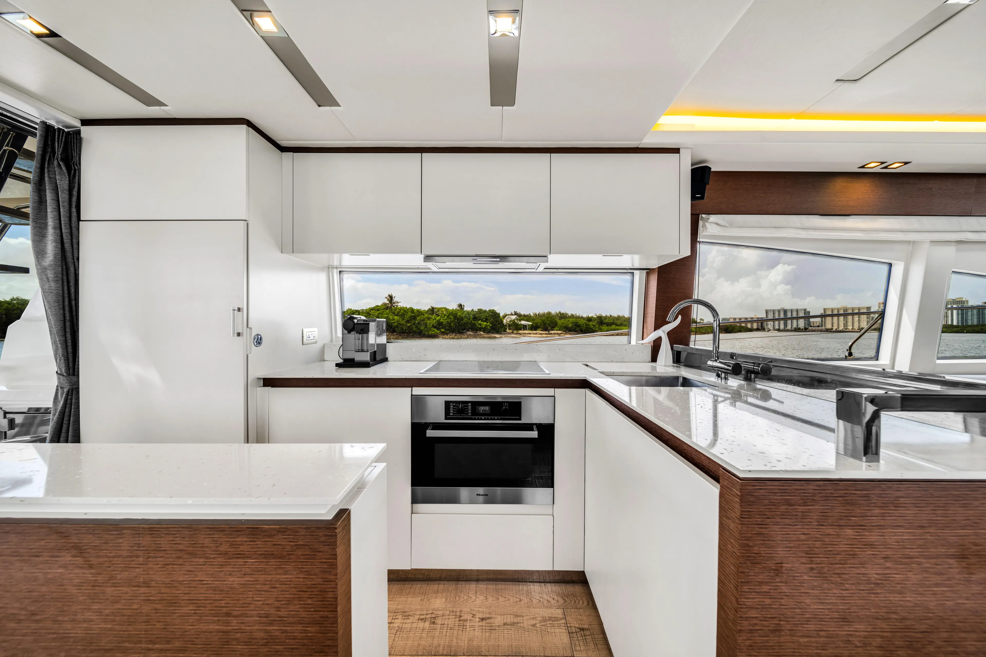 Oceana Yacht Photos Pics Luxurious kitchen interior on a 2015 Prestige 750 yacht, featuring modern appliances and sleek design.