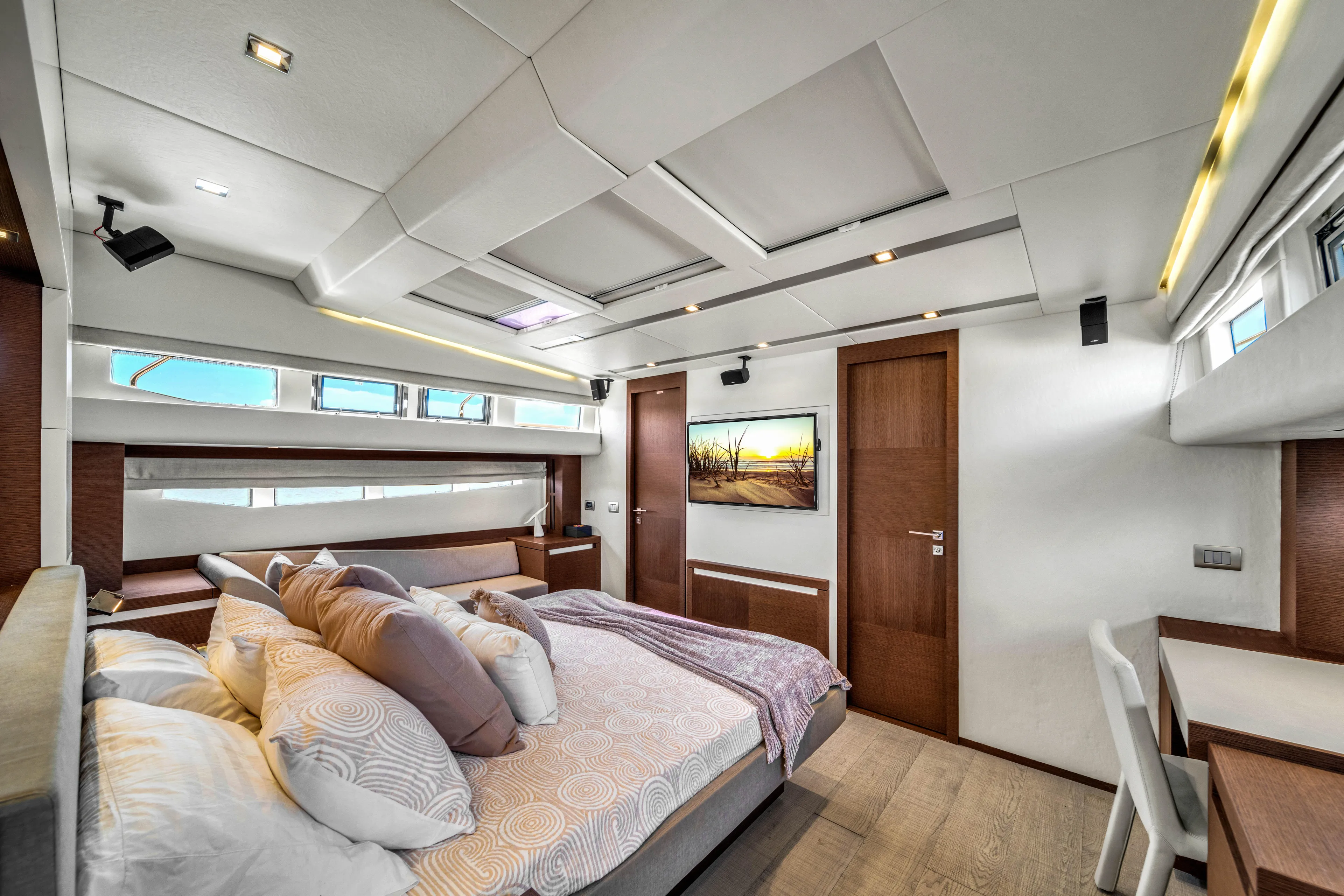 Oceana Yacht Photos Pics Luxurious bedroom interior of 2015 Prestige 750 yacht with modern design and elegant furnishings.