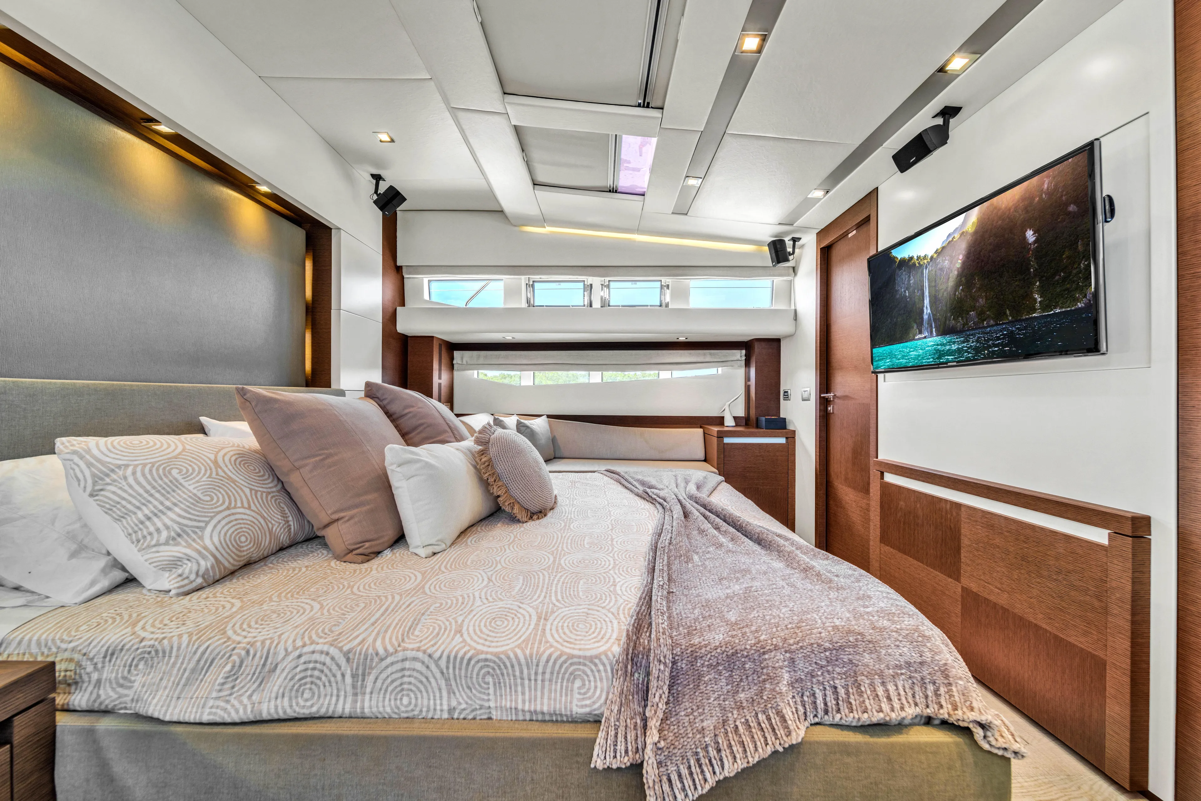 Oceana Yacht Photos Pics Luxurious bedroom interior of 2015 Prestige 750 yacht with modern decor and large bed.