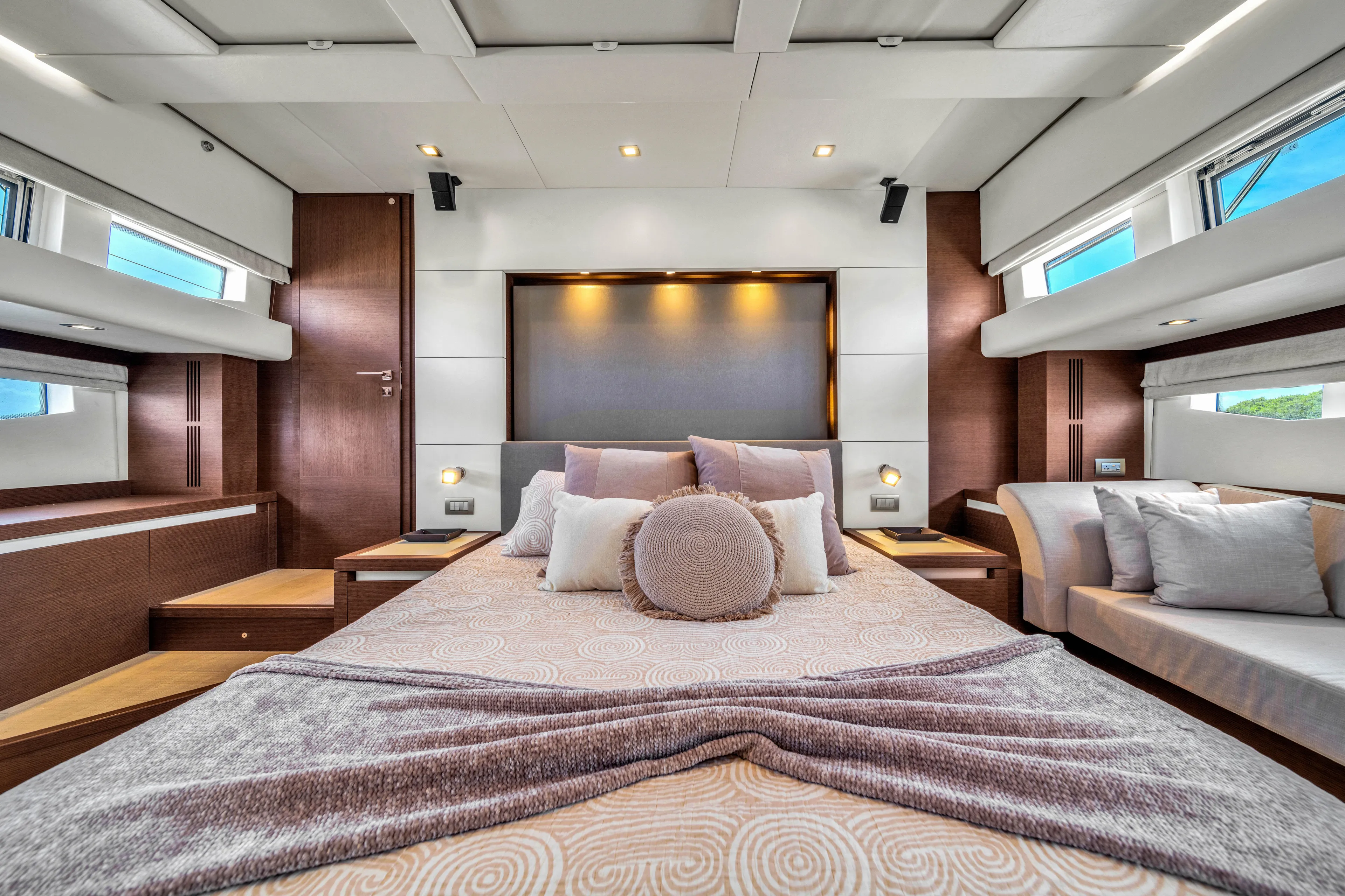 Oceana Yacht Photos Pics Luxurious interior of a 2015 Prestige 750 yacht with elegant bedding and modern design.