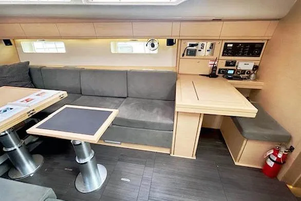Second Wind Yacht Photos Pics Interior of 2017 Jeanneau 54 yacht with modern seating and navigation equipment.