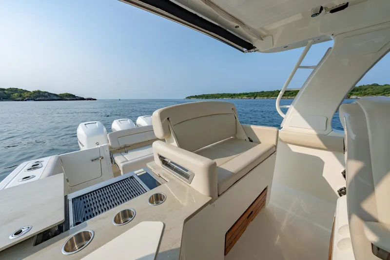 Blue Skies Yacht Photos Pics 2019 Boston Whaler 350 EX REALM boat interior with ocean view.