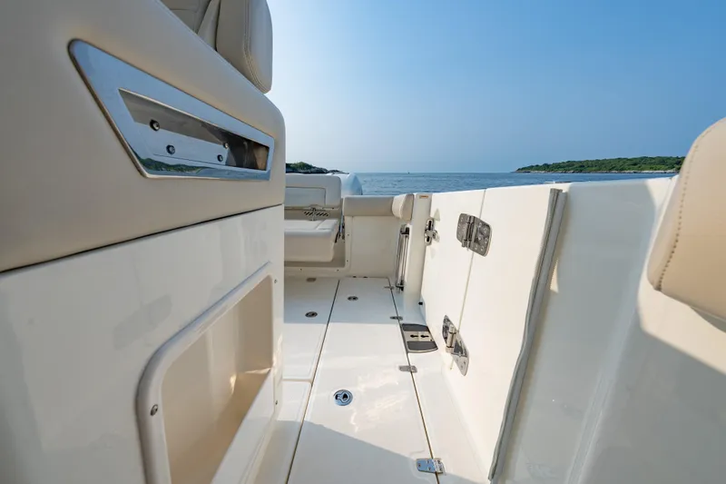 Blue Skies Yacht Photos Pics 2019 Boston Whaler 350 EX REALM boat interior with ocean view and sleek design.