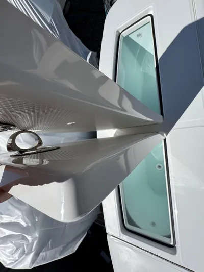  Yacht Photos Pics 2025 Regulator 28 boat detail, showcasing sleek design and modern features.