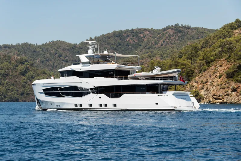 Numarine 32xp Yacht Photos Pics Luxurious 2026 Numarine 32XP yacht cruising near scenic coastline.