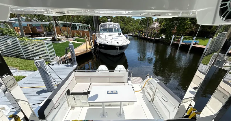 Rosie 3 Yacht Photos Pics 2022 Jeanneau Leader 10.5 WA Series 2 docked in a scenic canal setting.