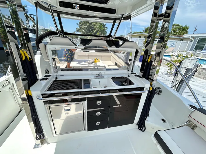 Rosie 3 Yacht Photos Pics 2022 Jeanneau Leader 10.5 WA Series 2 boat interior with modern kitchen amenities.