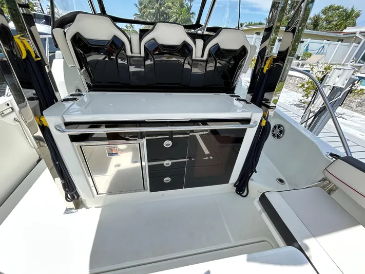 Rosie 3 Yacht Photos Pics 2022 Jeanneau Leader 10.5 WA Series 2 boat interior with seating and storage.