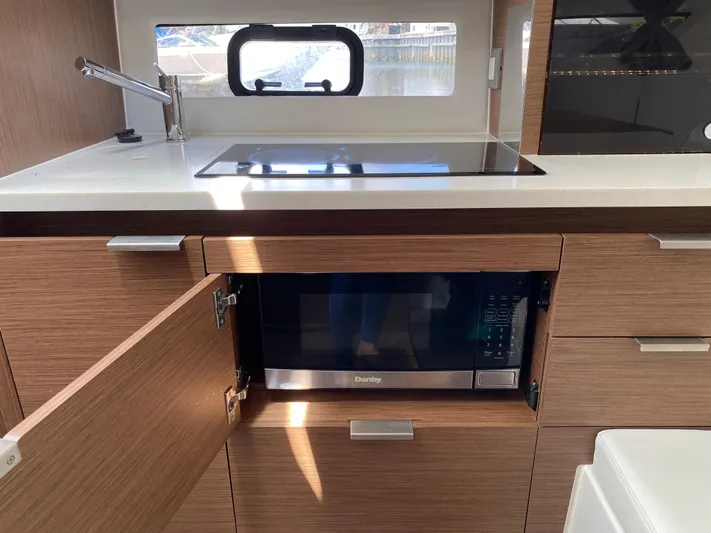Rosie 3 Yacht Photos Pics Modern kitchen area in 2022 Jeanneau Leader 10.5 WA Series 2 boat.