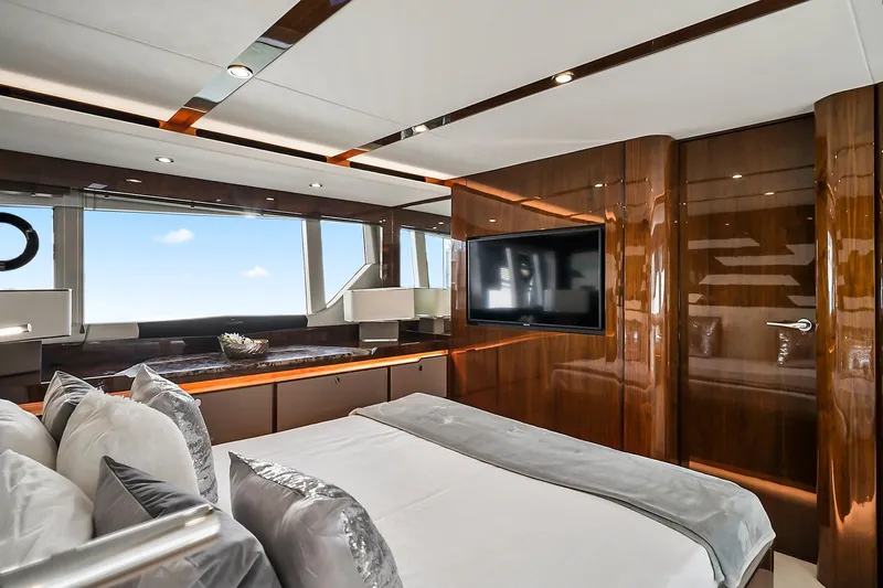 Raw Wave Yacht Photos Pics Luxurious interior of 2021 Fairline Squadron 68 yacht with elegant wood finishes and modern amenities.