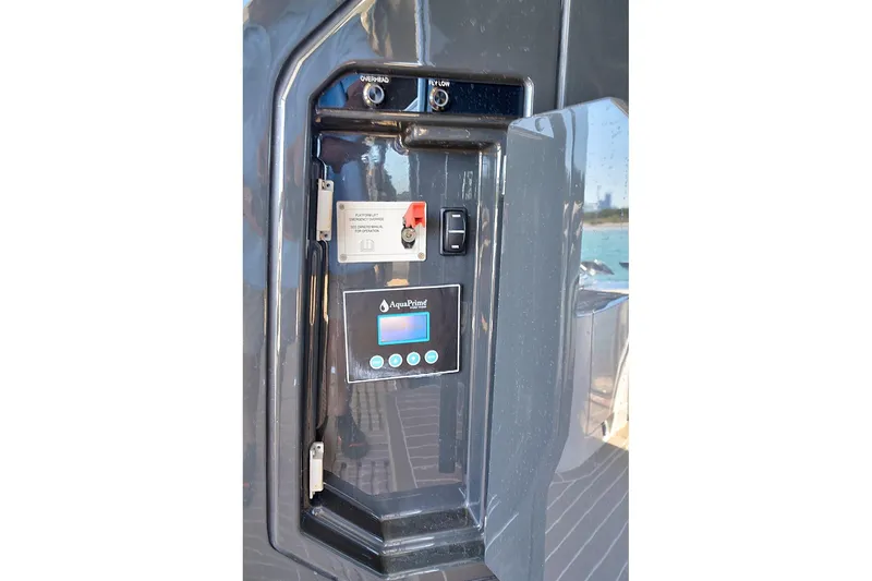 Raw Wave Yacht Photos Pics Control panel on 2021 Fairline Squadron 68 yacht, featuring AquaPrime system.