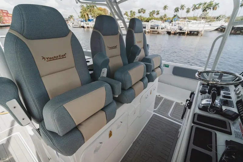  Yacht Photos Pics Luxury seating on 2024 YachtCat 41, featuring ergonomic design and waterfront view.