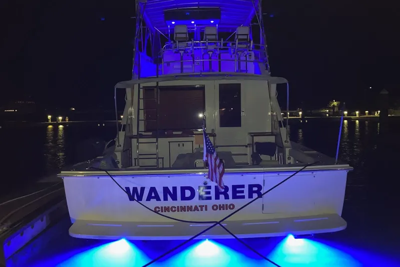 Wonderer Yacht Photos Pics 1987 Bertram 54 Convertible yacht "Wanderer" with blue lights at night, Cincinnati, Ohio.