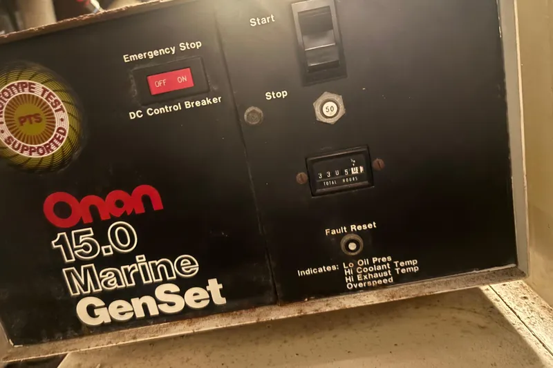 Wonderer Yacht Photos Pics Onan 15.0 Marine GenSet control panel on 1987 Bertram 54 Convertible.