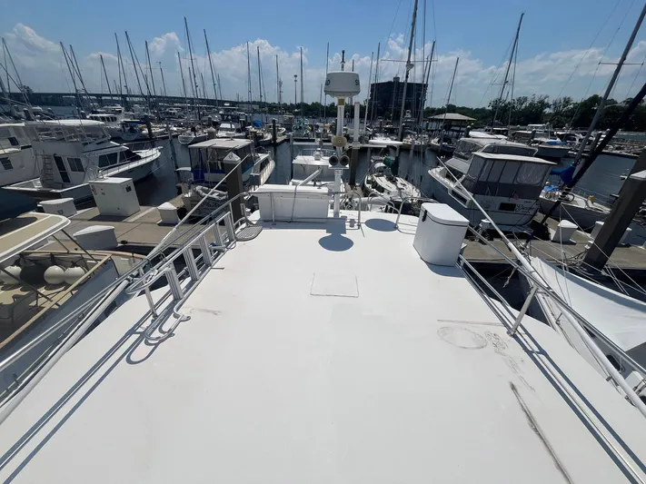 Bazan Yacht Photos Pics Top deck view of 2001 Great Harbour GH47 yacht in a marina.