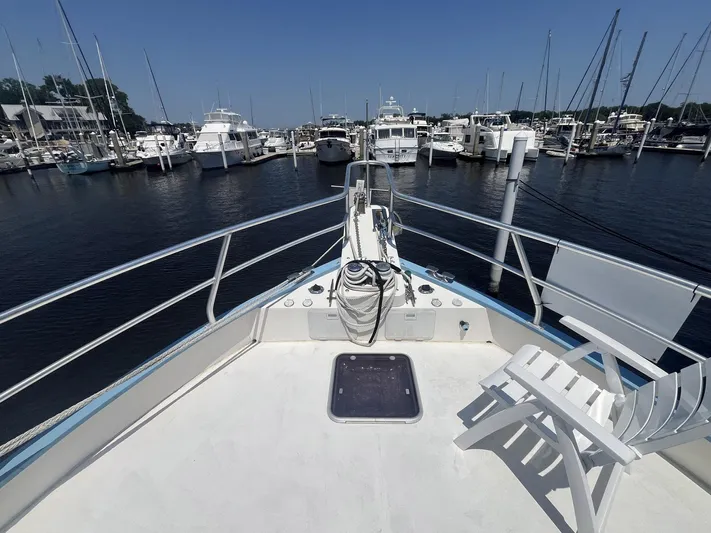 Bazan Yacht Photos Pics Bow view of 2001 Great Harbour GH47 yacht docked at marina with clear sky.