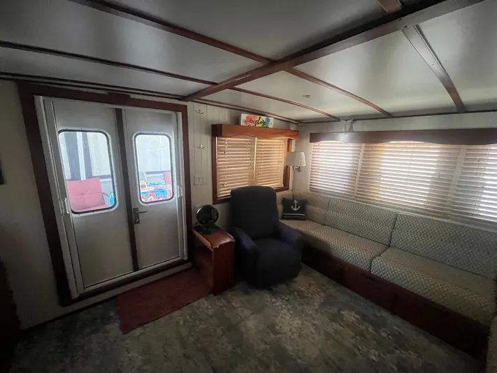 Bazan Yacht Photos Pics Interior of 2001 Great Harbour GH47 yacht with cozy seating and natural light.