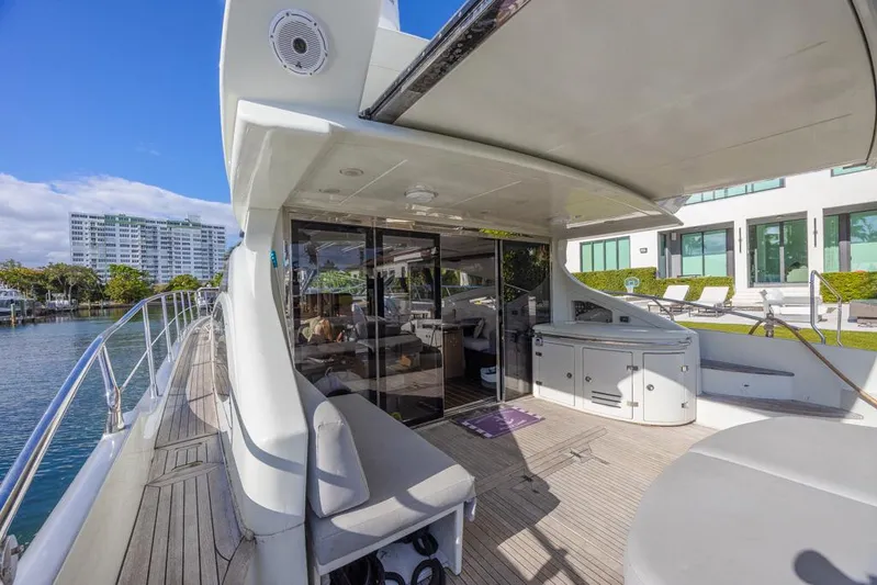  Yacht Photos Pics 2009 Azimut 68S yacht deck with modern seating and waterfront view.